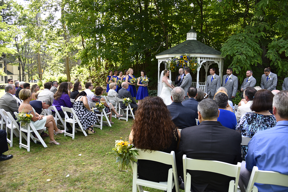 Wedding ceremony in front of gazebo at the Wentworth Inn.