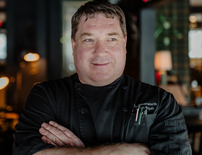 A culinary team member wearing a Wentworth shirt.