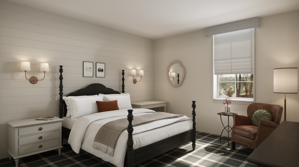 Photo of Bedroom image with chairs and a window facing the trees at the Wentworth.