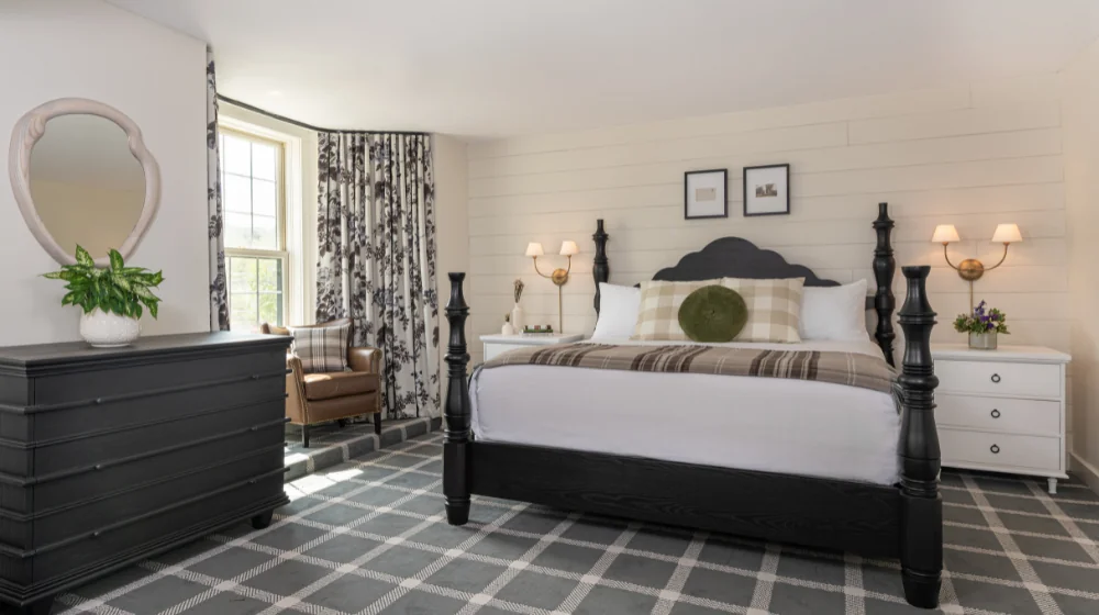 Bedroom with wall decor and furniture